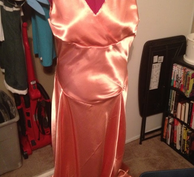 One of my very first costumes. Full of puckers, unpressed and unfinished seams, and much sadness. Worn once and still hanging in my closet.