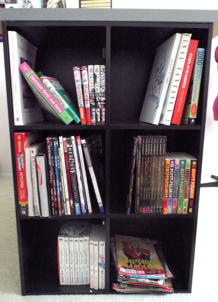 The geeky/fun side. This holds most of my comics, trades, Japanese study materials, and manga! 