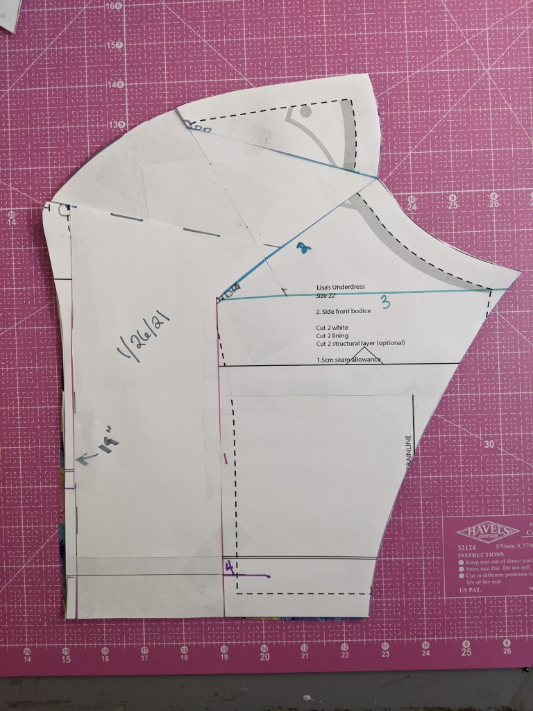 Overhead shot of altered side front piece. At the side front seam, there is a note that reads 19" with an arrow pointing to the seam.